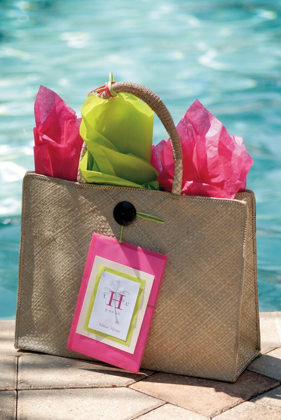 Pink Welcome Bags
Photography: Mermin + Christie Photographers
Read More:
http://www.insideweddings.com/weddings/tropical-theme-beach-wedding-in-naples-florida/184/ Brown tote bag filled with pink and green paper