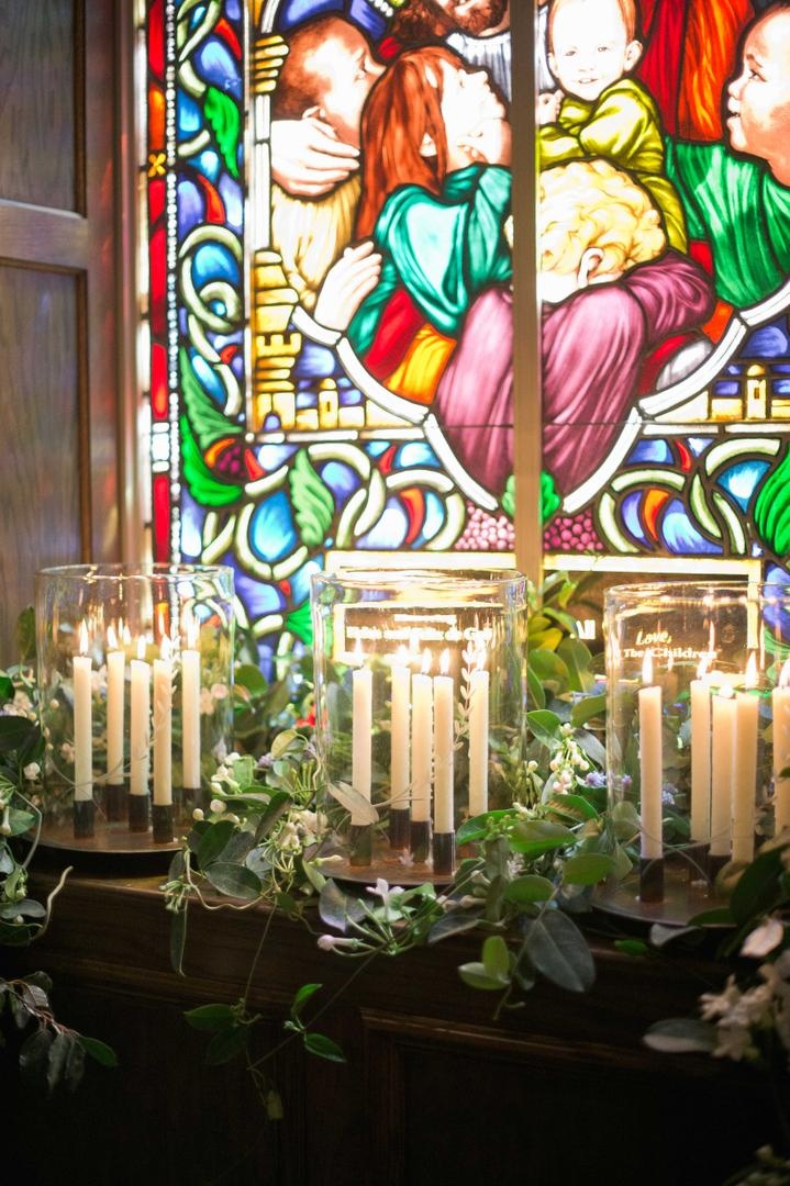 Stained-Glass Window
Photography: Harwell Photography
Read More:
http://www.insideweddings.com/weddings/romantic-woodland-inspired-atlanta-wedding-with-natural-details/433/ Church wedding ceremony with candles and stained glass