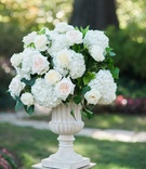 Stone Urn with Hydrangea %26 Rose Flowers
Photography: Sarah Bradshaw Photography
Read More:
http://www.insideweddings.com/weddings/stunning-military-wedding-with-garden-ceremony-in-washington-dc/999/ Stone urn on riser ceremony decoration outdoor wedding with white hydrangea pink rose ivory rose