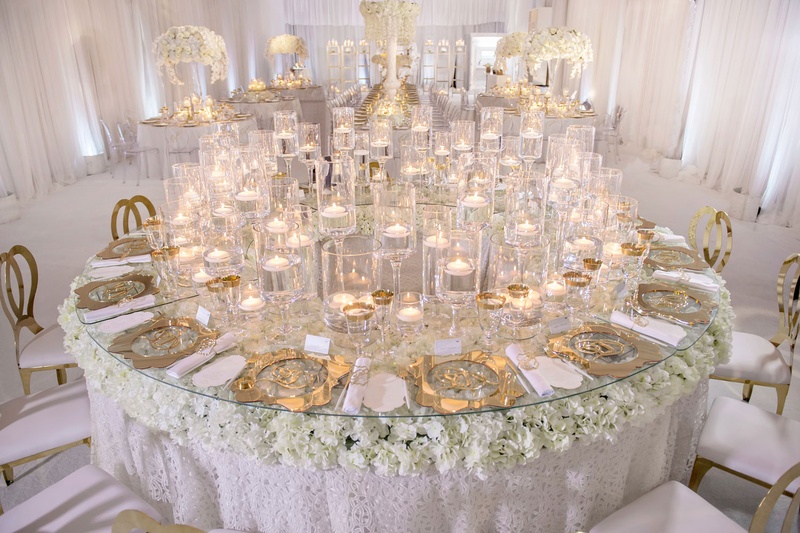 Reception Décor Photos Many Floating Candles on Round Table Inside