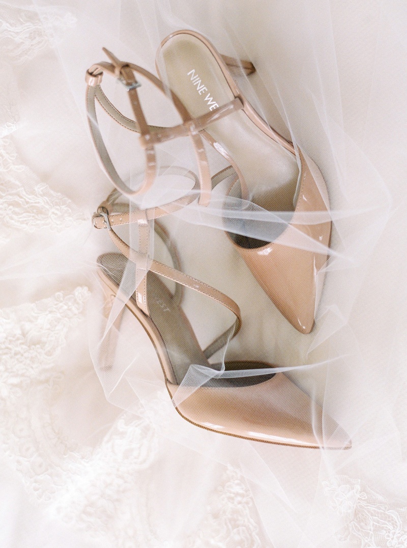 Nude Shoes with Bridal Veil
Photography: Branco Prata
Read More:
http://www.insideweddings.com/weddings/chic-destination-wedding-with-california-style-in-washington-dc/1042/ Wedding detail shot nude pumps ankle strap with white veil by Renee Pawele