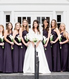 Bridesmaids in One-Shouldered Gowns
Photography: Sterling Imageworks
Read More:
http://www.insideweddings.com/weddings/sophisticated-soiree-at-a-presidential-library-in-little-rock/1033/ Bride in ball gown and fur wrap stole with bridesmaids in dark purple bridesmaid dresses calla lily