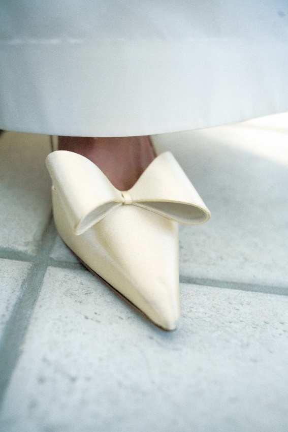 Ivory Bow Wedding Shoes
Photography: Susan Stripling Photography
Read More:
http://www.insideweddings.com/weddings/ocean-themed-wedding-in-southern-florida/167/ Kate Spade ivory wedding high heels with bow