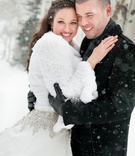 The Bride and Groom
Photography: Handeland Tesoro Photography
Read More:
http://www.insideweddings.com/weddings/snowy-outdoor-winter-ceremony-cozy-lodge-reception/522/ Couple in jackets during snow storm