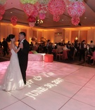 Bride and Groom
Photography: Michelle Walker Photography
Read More:
http://www.insideweddings.com/weddings/colorful-wedding-with-chinese-traditions-at-the-ritz-carlton/241/ Bride in a Vera Wang gown dances with groom in a black tuxedo