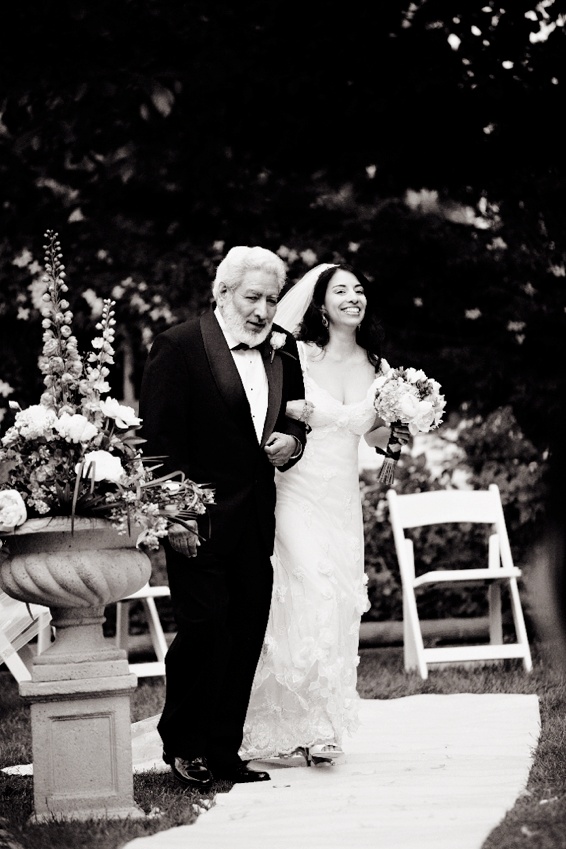 Bride and Father of the Bride
Photography: Chris + Lynn Photographers
Read More:
http://www.insideweddings.com/weddings/butterfly-inspired-spring-wedding-in-canada/189/ Black and white photo of bride in a Claire Pettibone gown walking down the aisle with her father