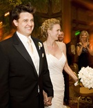 Newlyweds' Reception Entrance
Photography: Ventana Photography
Read More:
http://www.insideweddings.com/weddings/classic-fall-wedding-in-san-diego-california/290/ Bride and groom enter ballroom holding hands