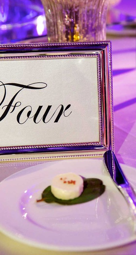 Script Font Table Number in Silver Frame
Photography: Bob %26 Dawn Davis Photography
Read More:
http://www.insideweddings.com/weddings/million-dollar-listing-miami-star-chad-carrolls-cleveland-wedding/732/ Table number in silver metallic frame with script font number written out