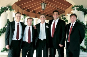 Groom In Black Tuxedo And Tie Groomsmen Tuxedos Red Ties Groom In Black Tuxedo And Tie Groomsmen Tuxedos Red Ties