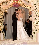 The Ceremony Kiss
Photography: Jay Lawrence Goldman Photography
Read More:
http://www.insideweddings.com/weddings/classic-contemporary-ballroom-wedding-in-pacific-palisades/264/ Bride and groom kissing under chuppah