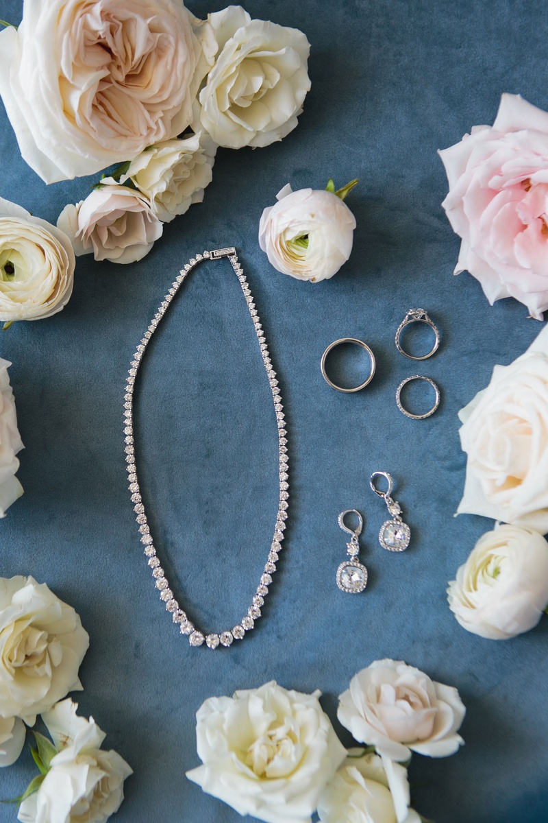 Wedding-Day Jewelry %26 Rings
Photography: Palos Studio
Read More:
http://www.insideweddings.com/weddings/ocean-view-ceremony-classic-reception-with-soft-blue-color-scheme/1371/ bride jewelry and accessories wedding rings, necklace, and earrings surrounded by garden rose flower