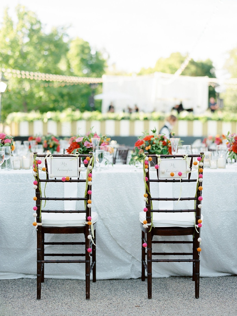 Bride %26 Groom Chairs with Vibrant Pom-Poms
Photography: Ryan Ray Photography
Read More:
http://www.insideweddings.com/weddings/outdoor-wedding-with-vibrant-pink-orange-decor-in-california/723/ Bride and groom wedding chairs with pom pom garland decorations