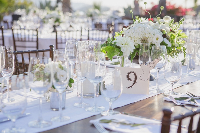 Rustic-Inspired Tablescape
Photography: Jasmine Star Photography
Read More:
http://www.insideweddings.com/weddings/spanish-style-ceremony-outdoor-ranch-wedding-reception/504/ Wood table with white runner and brown table number