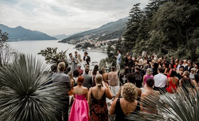 Guests at Ceremony in Lake Como
Photography: Lilly Red Creative
Read More:
http://www.insideweddings.com/weddings/daughters-of-simone-designers-summer-wedding-in-lake-como-italy/1218/ view of lake como from lugano switzerland wedding ceremony on cliff overlooking lake italy
