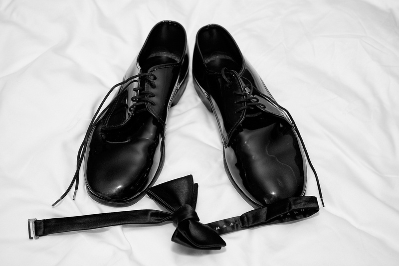 Groom's Black Shoes and Bow Tie
Photography: KingenSmith
Read More:
http://www.insideweddings.com/weddings/catholic-ceremony-soft-romantic-fairy-tale-reception-in-chicago/754/ grooms black dress shoes and bow tie on white sheet