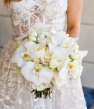 Ivory %26 White Rose and Orchid Bouquet
Photography: Genevieve Nisly Photography
Read More:
http://www.insideweddings.com/weddings/new-years-eve-wedding-with-a-dreamy-winter-wonderland-theme/1258/ bride in reem acra wedding dress from dimitra's bridal couture with white rose orchid bouquet