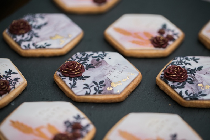Painted, Embossed Cookies
Photography: Jessica Claire Photography
Read More:
http://www.insideweddings.com/weddings/unique-chic-bridal-shower-with-dark-and-moody-color-scheme/1335/ painted sugar cookiers for bridal shower embossed with "till death"