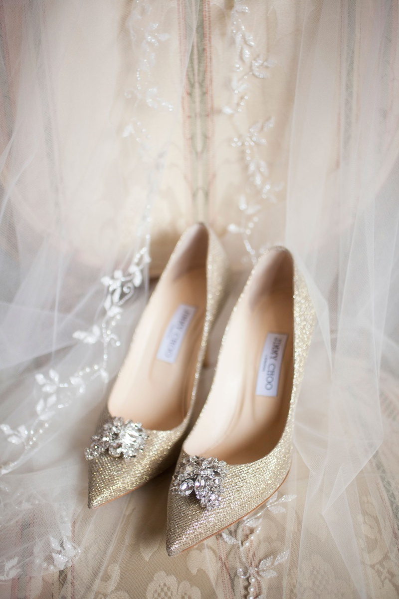 Sparkly Shoes with Crystal Details
Photography: Nancy Cohn Photography
Read More:
http://www.insideweddings.com/weddings/destination-wedding-with-white-gold-color-palette-in-palm-beach/1028/ Jimmy Choo gold sparkle pumps pointed toe crystal toe detail embellishments