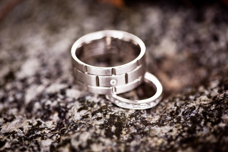 Custom Wedding Rings
Photography: Jana Williams Photography
Read More:
http://www.insideweddings.com/weddings/ivory-gold-blush-lakefront-new-hampshire-wedding/412/ Groom and bride wedding rings with diamonds on rock