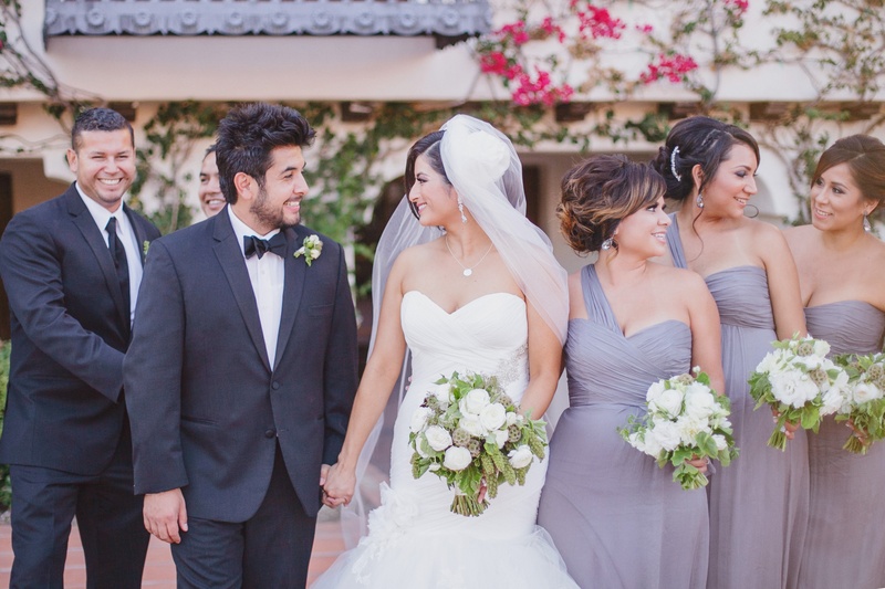 Outdoor Wedding Party
Photography: Jasmine Star Photography
Read More:
http://www.insideweddings.com/weddings/spanish-style-ceremony-outdoor-ranch-wedding-reception/504/ Purple bridesmaids and tuxedo groomsmen with couple