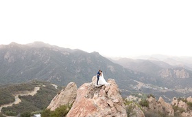Couple Portrait with Gorgeous Mountain View
Photography: Love %26 You Studios
Read More:
http://www.insideweddings.com/weddings/destination-wedding-with-unique-personalized-elements-in-malibu/1079/ Wedding photo bride and groom on rock hill mountain overlooking Malibu canyon views malibu rocky oak
