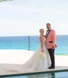 Bride and Groom by Ocean and Pool
Photography: Simone Photography
Read More:
http://www.insideweddings.com/weddings/tropical-destination-wedding-at-a-beach-house-in-cabo-san-lucas/1080/ oceanside wedding portrait, bride in mark zunino, groom in salmon tuxedo jacket