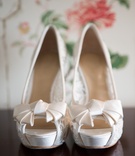 Lace Bridal Pumps
Photography: Aaron Watson Photography
Read More:
http://www.insideweddings.com/weddings/classic-virginia-wedding-inspired-by-grace-kellys-elegance/511/ Lace peep-toe wedding heels with ivory bows