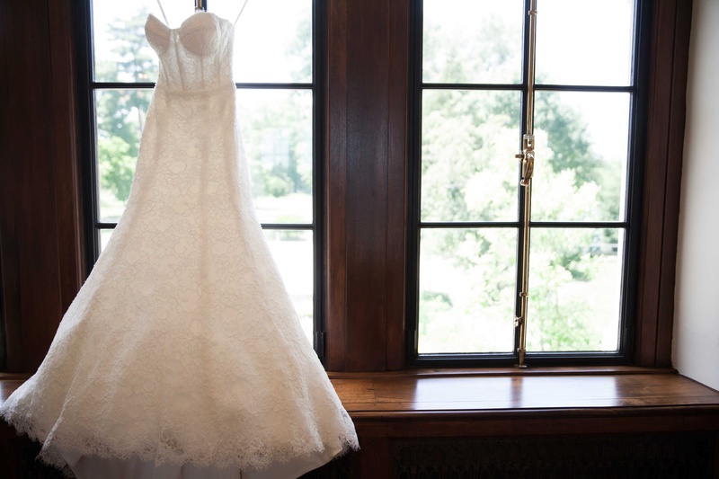 Bride's Ceremony Gown Hung Up
Photography: Michael Bambino %26 Co.
Read More:
http://www.insideweddings.com/weddings/whimsical-open-air-secret-garden-wedding-with-soft-spring-hues/777/ a bride's gorgeous gown with a modified a-line skirt and corset top hung up