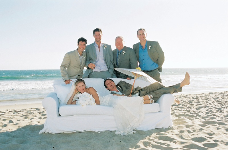 Family Beach Portrait
Photography: John Solano Photography
Read More:
http://www.insideweddings.com/weddings/tented-beach-wedding-in-malibu-california/24/ Bride and groom with family on white sofa on beach