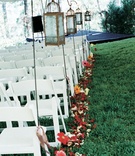 Lantern-Lined Aisle
Photography: MBV Photography
Read More:
http://www.insideweddings.com/weddings/asian-inspired-summer-wedding-in-the-hills-of-north-carolina/159/ Outdoor ceremony with white chairs and lanterns