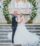 Couple in Front of Circular Arch
Photography: LuvRox Photography
Read More:
http://www.insideweddings.com/weddings/luxurious-destination-wedding-at-the-ocean-club-in-the-bahamas/1324/ bride in lace a-line isabelle armstrong gown with groom in front of circular ceremony arch