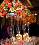 Vibrant Floral Centerpieces
Photography: Vallentyne Photography
Read More:
http://www.insideweddings.com/weddings/spring-wedding-at-the-lodge-at-torrey-pines/388/ Transparent vases topped with orange flowers