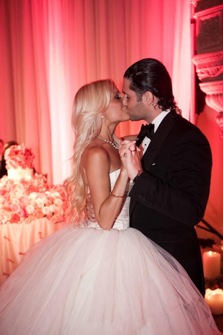 Newlyweds' Reception Kiss
Photography: Lauren Ross Photography %26 Nancy Cohn Photography
Read More:
http://www.insideweddings.com/weddings/sophisticated-breakers-wedding-with-pink-florals/335/ Bride and groom kiss at pink wedding reception
