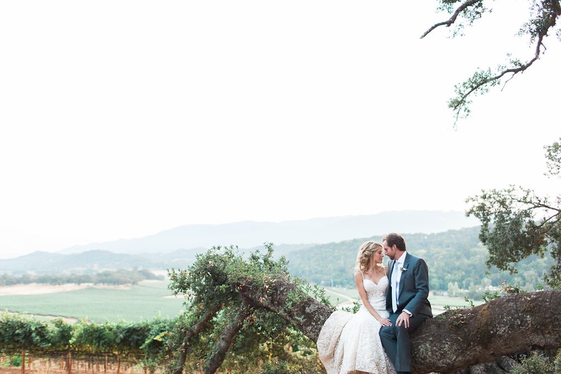 Bride %26 Groom on Tree Branch
Photography: Katie Shuler Photography
Read More:
http://www.insideweddings.com/weddings/rustic-chic-outdoor-wedding-at-a-winery-in-northern-california/945/ Bride and groom smiling at each other after rustic wedding with gorgeous scenery California rustic