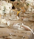 Elegant Tablescape
Photography: Victor Sizemore Photography
Read More:
http://www.insideweddings.com/weddings/twilight-inspired-wedding-at-the-langham-huntington-in-california/359/ Champagne linens with low floral arrangements