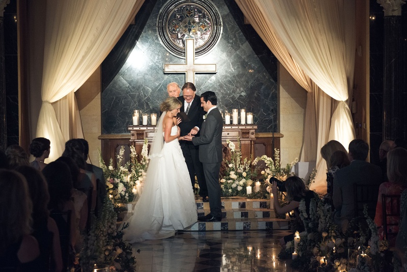 Minimal Church-Like Ceremony Décor
Photography: Triple Cord Photography
Read More:
http://www.insideweddings.com/weddings/destination-wedding-with-outdoor-reception-lavish-after-party/982/ Bride and groom at church decor ceremony look cross candles low flower arrangement oscar de la renta