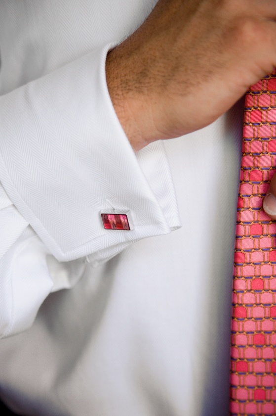 Matching Tie and Cuff Links
Photography: Mark Nixon Photographer
Read More:
http://www.insideweddings.com/weddings/destination-wedding-on-the-greek-island-of-santorini/207/ Groom getting ready wearing white and pink