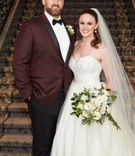 Groom in Maroon Suit %26 Bride in Ball Gown
Photography: KingenSmith
Read More:
http://www.insideweddings.com/weddings/opulent-wedding-with-organic-textures-elegant-decor-in-chicago/1010/ Bride in strapless ball gown detachable skirt sweetheart neckline groom in burgundy tuxedo bow tie