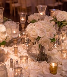 Head Table with Roses and Candles
Photography: Carasco Photography
Read More:
http://www.insideweddings.com/weddings/jewish-wedding-with-classic-ivory-and-gold-decor-in-chicago/983/ classic wedding with white roses and crystal candle holders, gold votives
