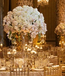 Full Floral Centerpiece
Photography: Carasco Photography
Read More:
http://www.insideweddings.com/weddings/elegant-wedding-with-gold-champagne-color-palette-in-chicago/1124/ wedding at the gold coast room at the drake hotel, gold chiavari chairs, large tall centerpieces
