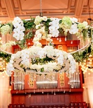 Two-Tiered Floral Chandelier
Photography: Chard Photo
Read More:
http://www.insideweddings.com/weddings/nashville-wedding-with-black-white-and-gold-color-palette/1077/ two-tiered floral chandelier with orchids, hydrangeas, and greenery