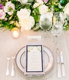 Place Setting with Floral Runner %26 Greenery
Photography: Kurstin Roe Photography
Read More:
http://www.insideweddings.com/weddings/elegant-outdoor-ceremony-ballroom-reception-in-washington-dc/1169/ Wedding reception place setting flower and greenery runner white purple rose lavender flower motif