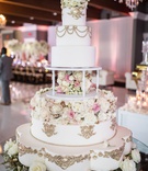 Royal Wedding Cake with Fresh Flowers
Photography: Brian Bossany Photography
Read More:
http://www.insideweddings.com/weddings/luxurious-heaven-inspired-royal-wedding-celebration-in-minneapolis/1333/ wedding cake with gold details fresh and sugar flowers scallop details pretty table royal monogram