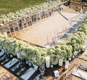 U-Shaped Reception Table
Photography: Vue Photography
Read More:
http://www.insideweddings.com/weddings/southern-lake-house-wedding-with-ivory-and-green-color-palette/534/ Rustic wood table topped with green hydrangea runner