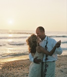 Sunset Dance on Beach
Photography: Suzanne Karp Photography
Read More:
http://www.insideweddings.com/weddings/seaside-wedding-in-california-with-beach-themed-decor/45/ Bride and groom dance together on sand with sunset in background