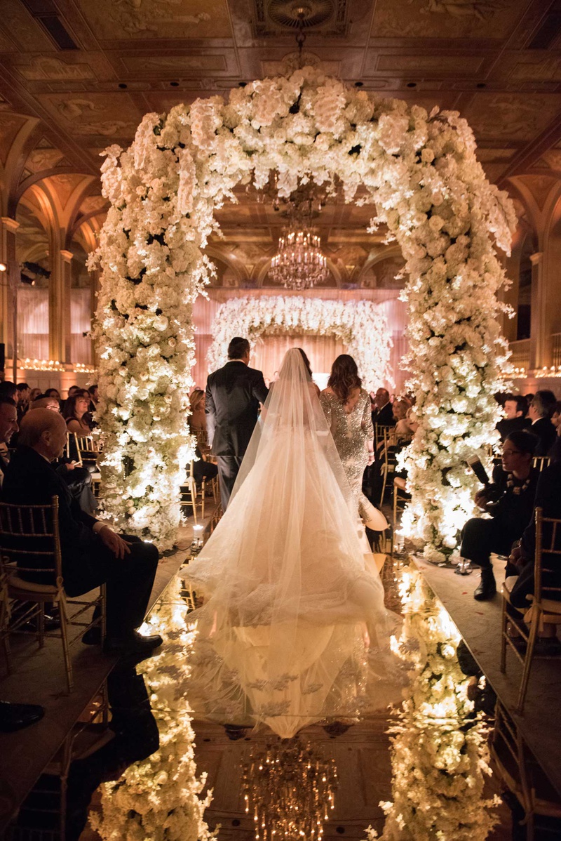 Bride with Parents Under Arches
Photography: The Day by Ira Lippke
Read More:
http://www.insideweddings.com/weddings/opulent-luxury-wedding-with-timeless-color-palette-in-new-york-city/1199/ the plaza wedding ceremony flower arch mirror aisle jewish wedding ceremony