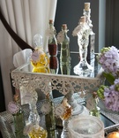 Custom Perfumes on Mirrored Display
Photography: Elizabeth Solano for John Solano Photography
Read More:
http://www.insideweddings.com/weddings/colorful-spring-bridal-shower-on-a-rooftop-in-new-york-city/965/ custom perfumes mirrored display new york city bridal shower favors vintage
