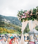 Sikh Ceremony at California Ranch
Photography: Scott Clark Photo
Read More:
http://www.insideweddings.com/weddings/whimsical-outdoor-destination-wedding-at-a-ranch-in-california/1378/ wedding ceremony arbor pink flowers greenery guests on floor for traditional ceremony view of ranch