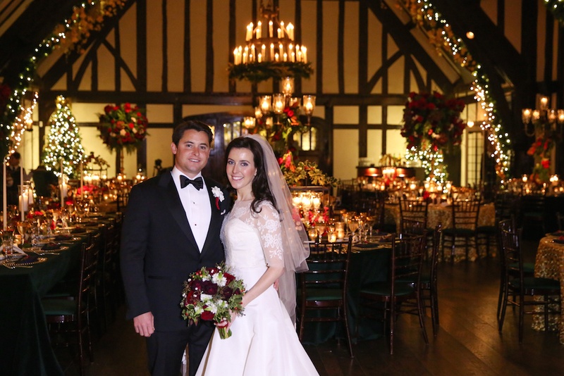 Bride %26 Groom at Christmas-Theme Reception
Photography: Robyn Rachel Photography
Read More:
http://www.insideweddings.com/weddings/christmas-theme-wedding-with-festive-red-green-decor-in-illinois/729/ Bride in Oscar de la Renta wedding dress with groom in reception room with holiday theme