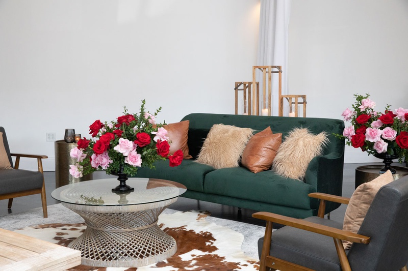 Derby Lounge Area
Photography: Collin Pierson Photography
Read More:
http://www.insideweddings.com/weddings/equestrian-themed-bridal-shower-inspired-by-the-kentucky-derby/1326/ kentucky derby themed bridal shower, emerald couch, leather pillow, cow skin rug, red and pink roses